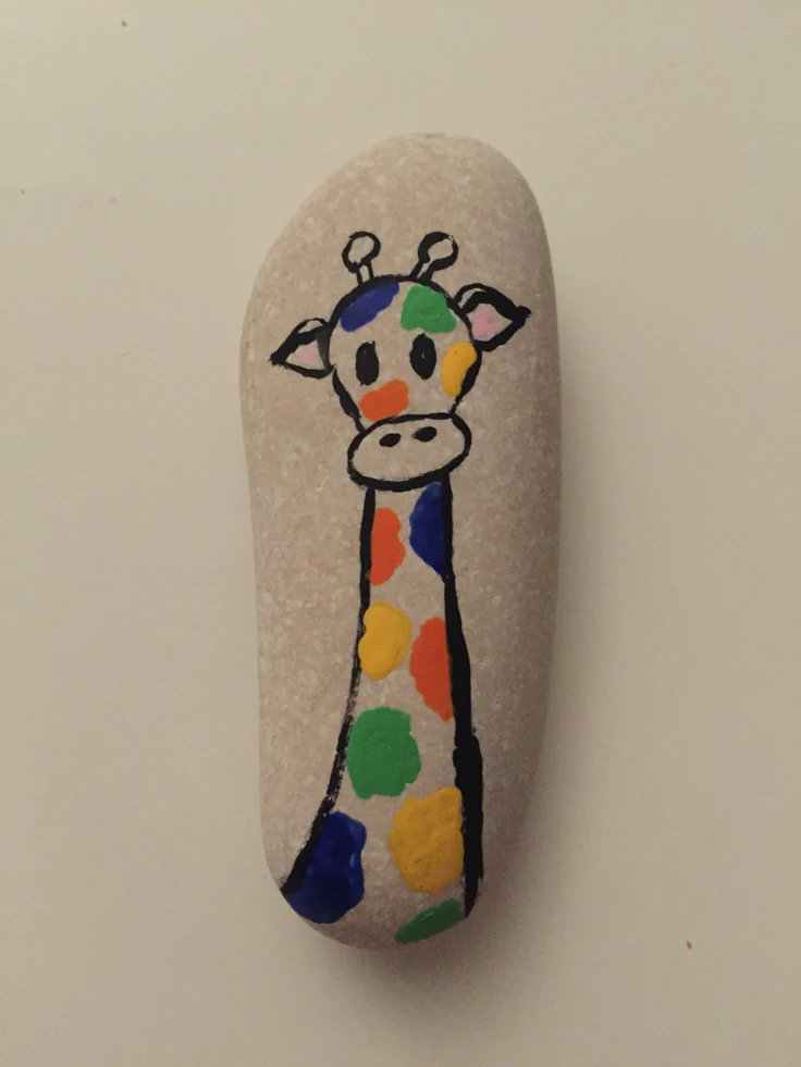 Giraffe painted stone rock